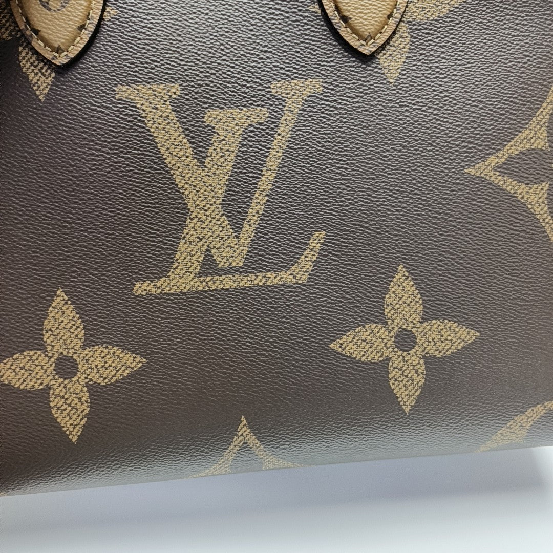 ONTHEGO MM Monogram Coated Canvas Brown