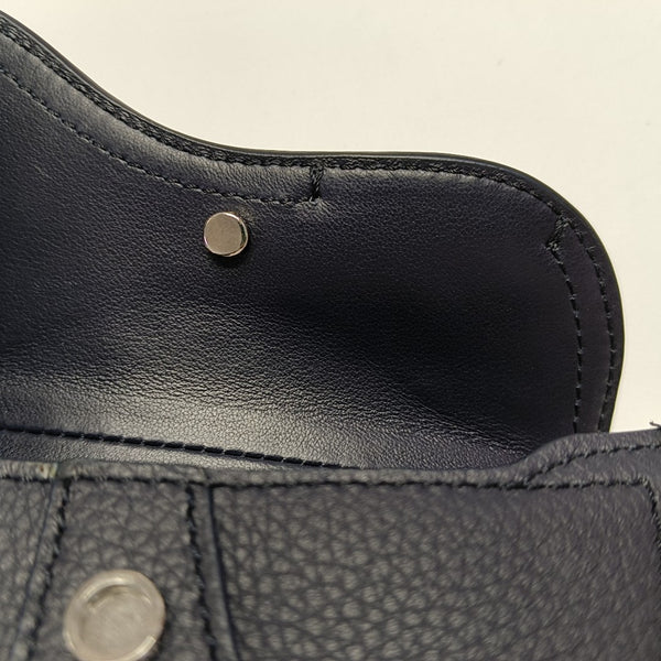 Authenticated pre-owned  Saddle Calfskin Blue - Clutch at Looply