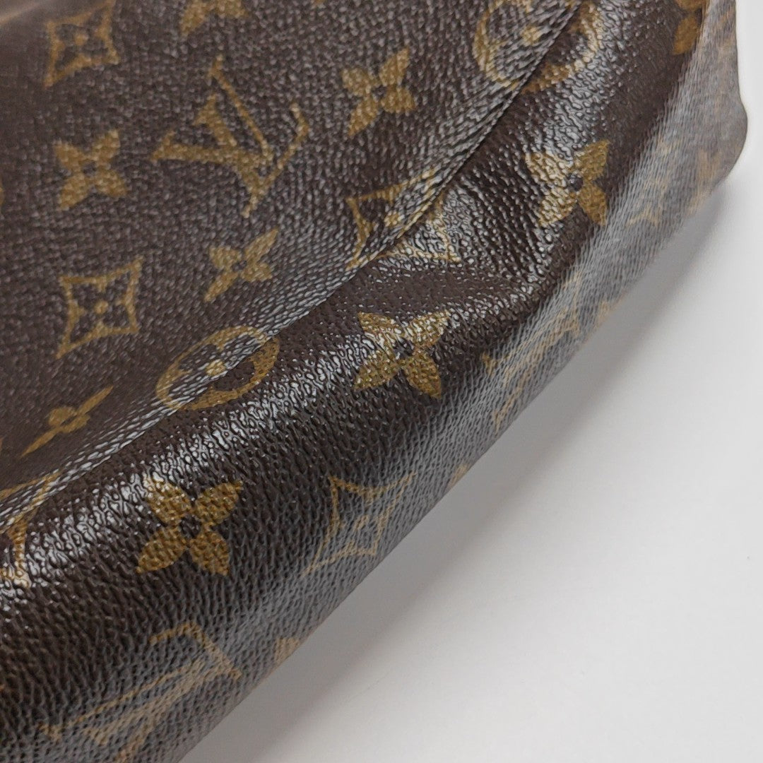 TROUSSE TOILETTE GM Monogram Coated Canvas Brown