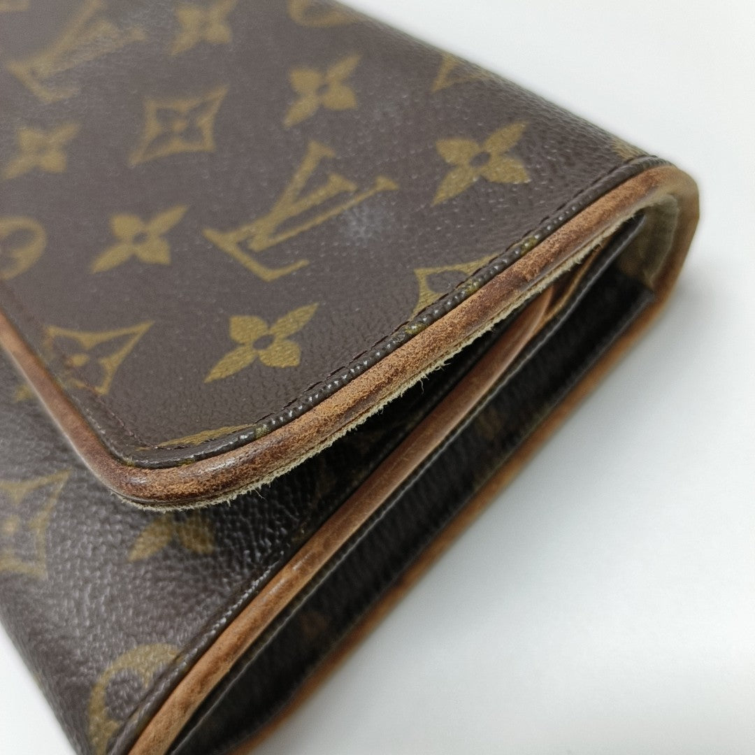 TWIN GM Monogram Coated Canvas Brown