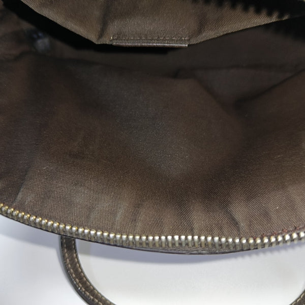 Dome Monogram Coated Canvas Brown