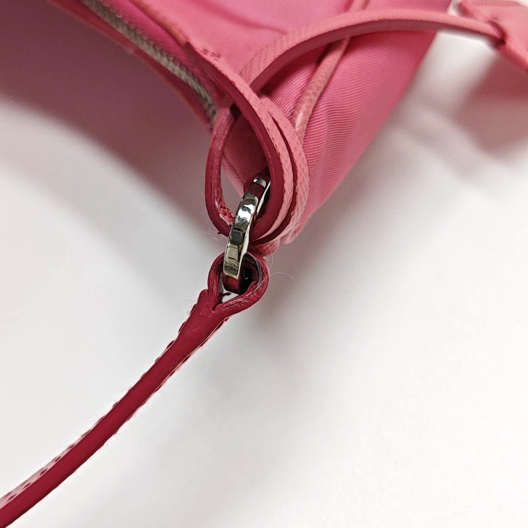Authenticated pre-owned  Re-Edition2005 Mini Nylon Red - Top Handle Bag at Looply