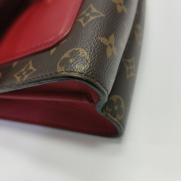 VICTOIRE Monogram Coated Canvas Brown