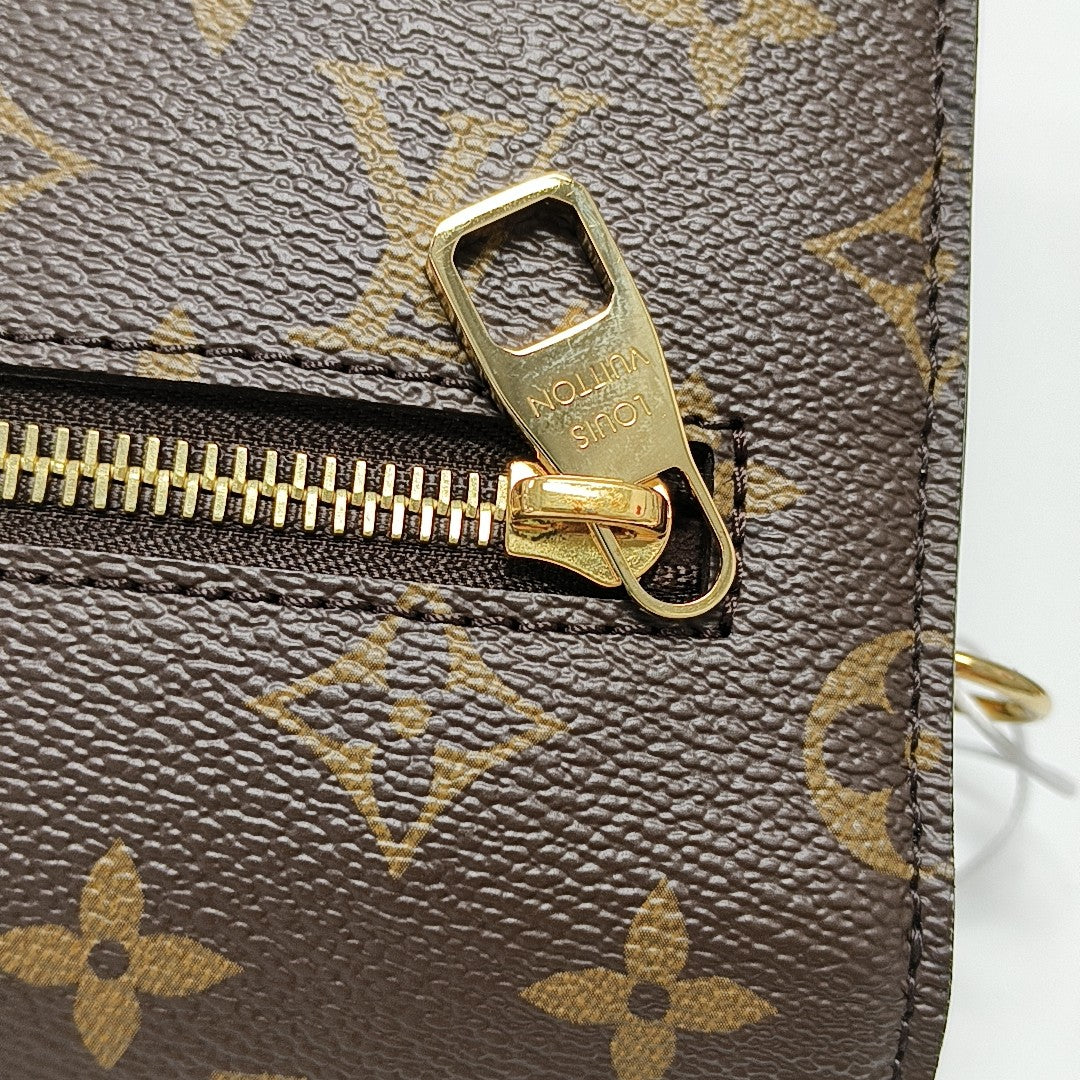 MÉTIS MM Monogram Coated Canvas Brown