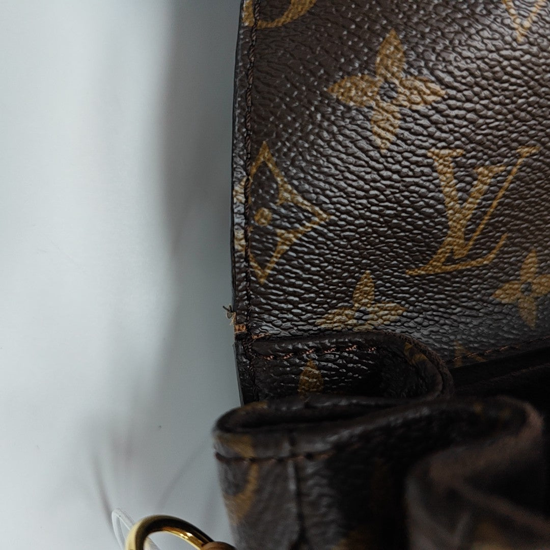MÉTIS MM Monogram Coated Canvas Brown