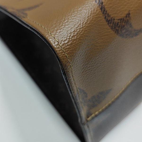ONTHEGO GM Monogram Coated Canvas Brown