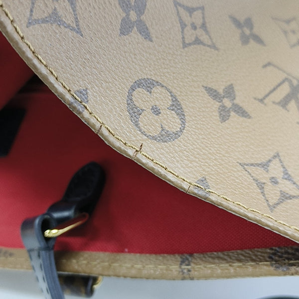 ONTHEGO MM Monogram Coated Canvas Brown
