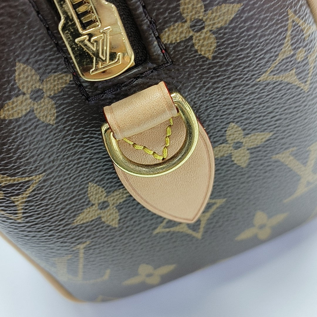 SPEEDY 20 Monogram Coated Canvas Brown