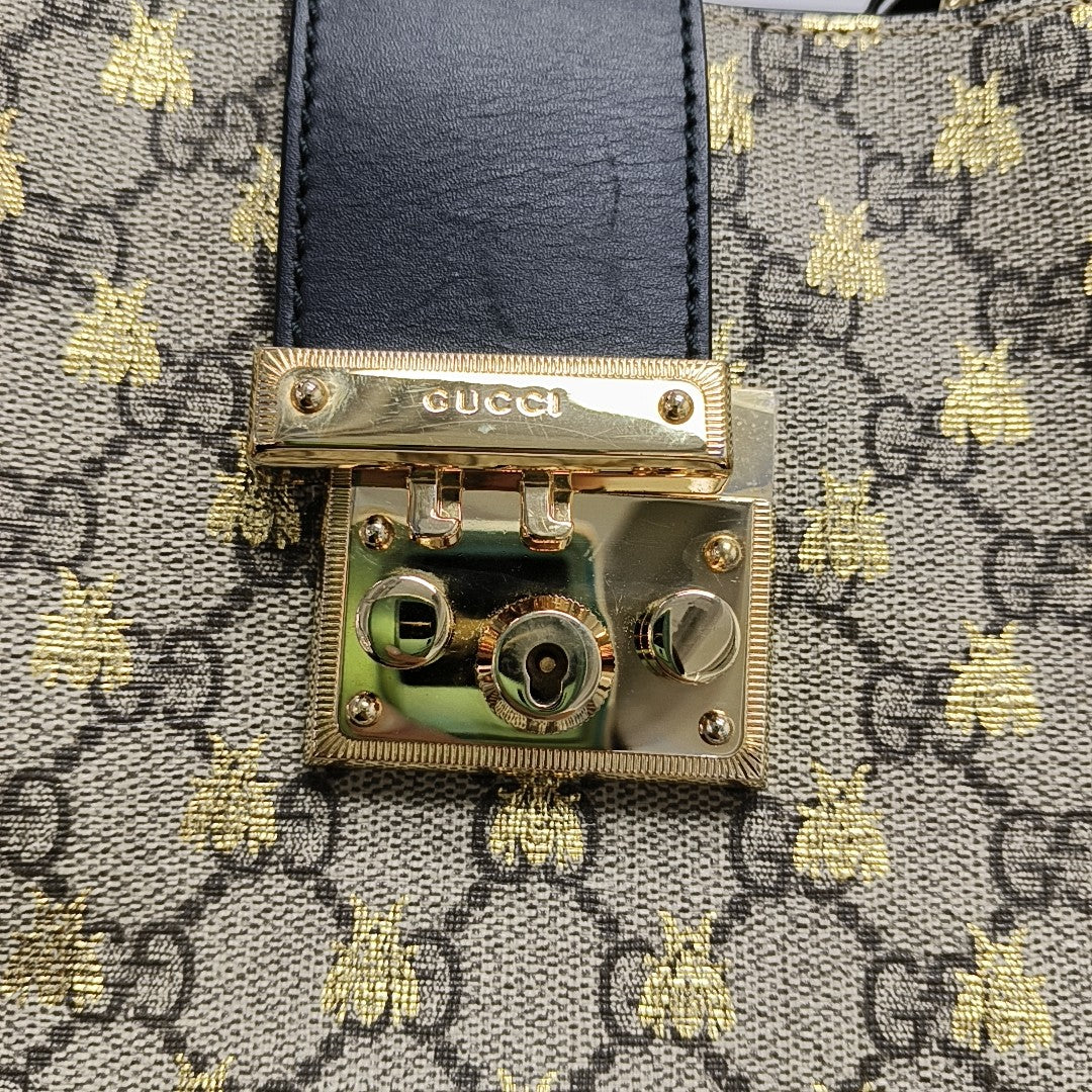 Padlock Medium Monogram Coated Canvas Brown