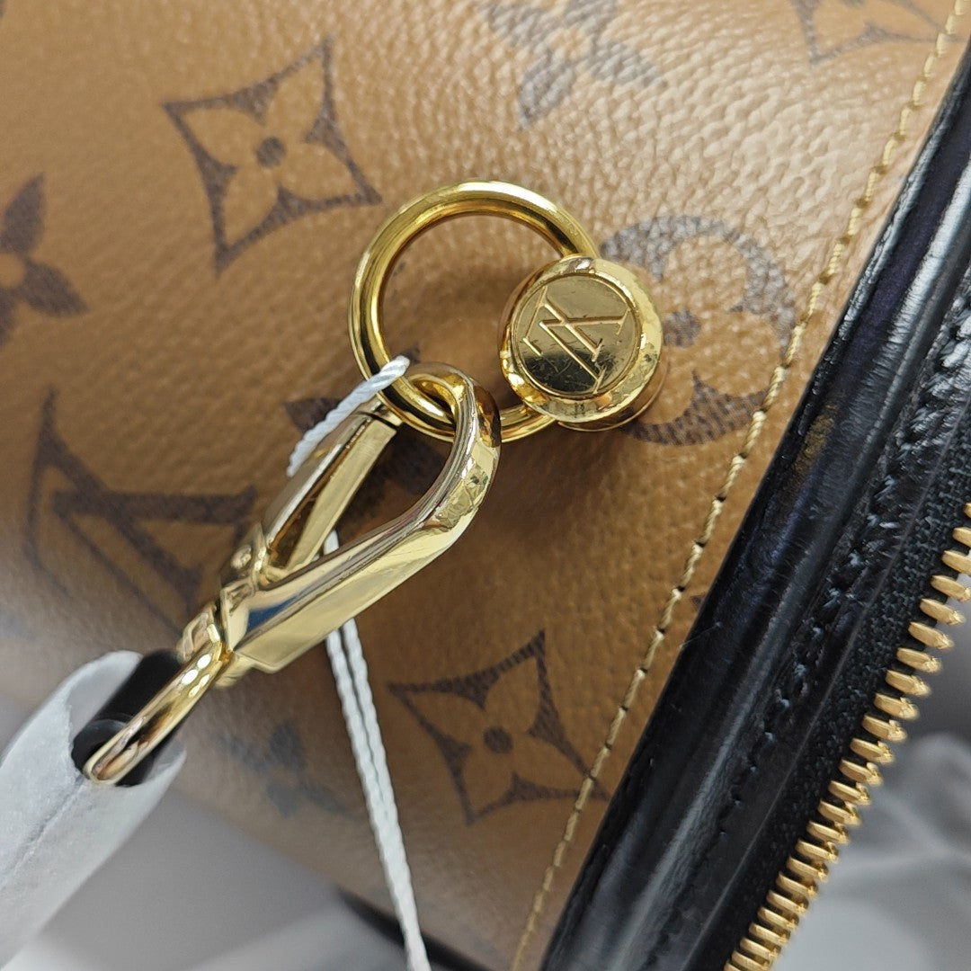 CANNES PM Monogram Coated Canvas Brown