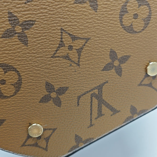 CANNES PM Monogram Coated Canvas Brown