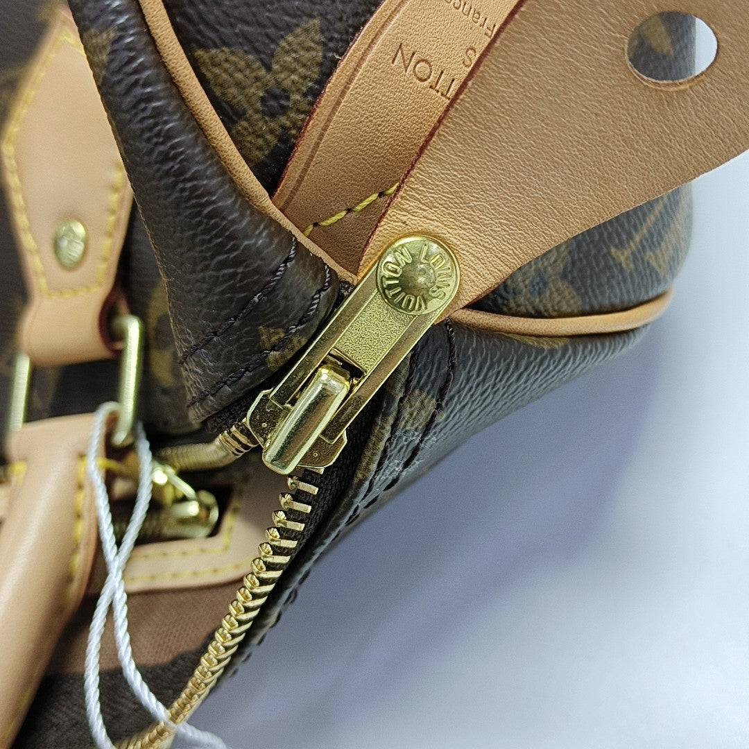 SPEEDY 30 Monogram Coated Canvas Brown