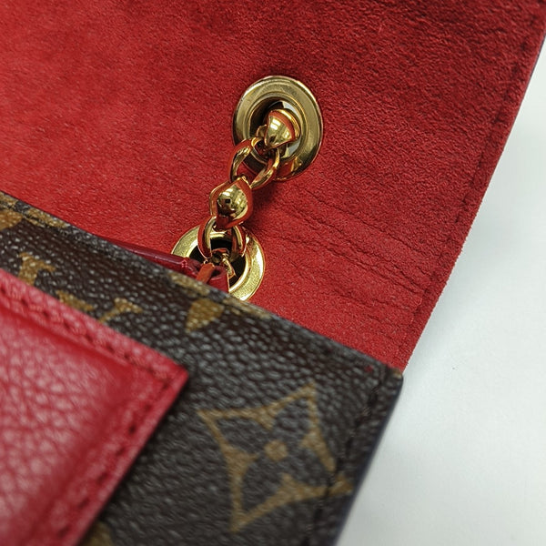 VICTOIRE Monogram Coated Canvas Brown