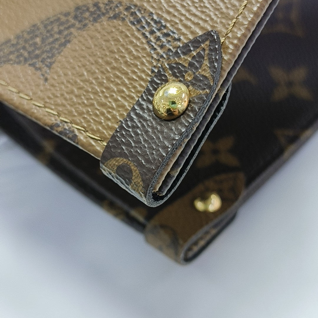ONTHEGO MM Monogram Coated Canvas Brown