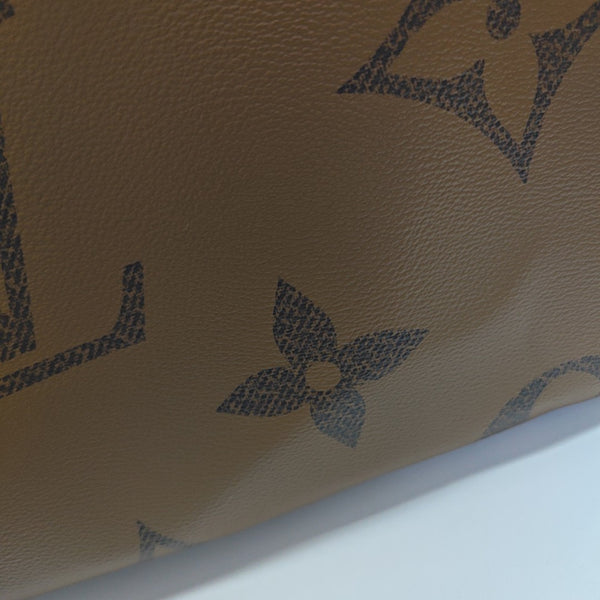 ONTHEGO MM Monogram Coated Canvas Brown