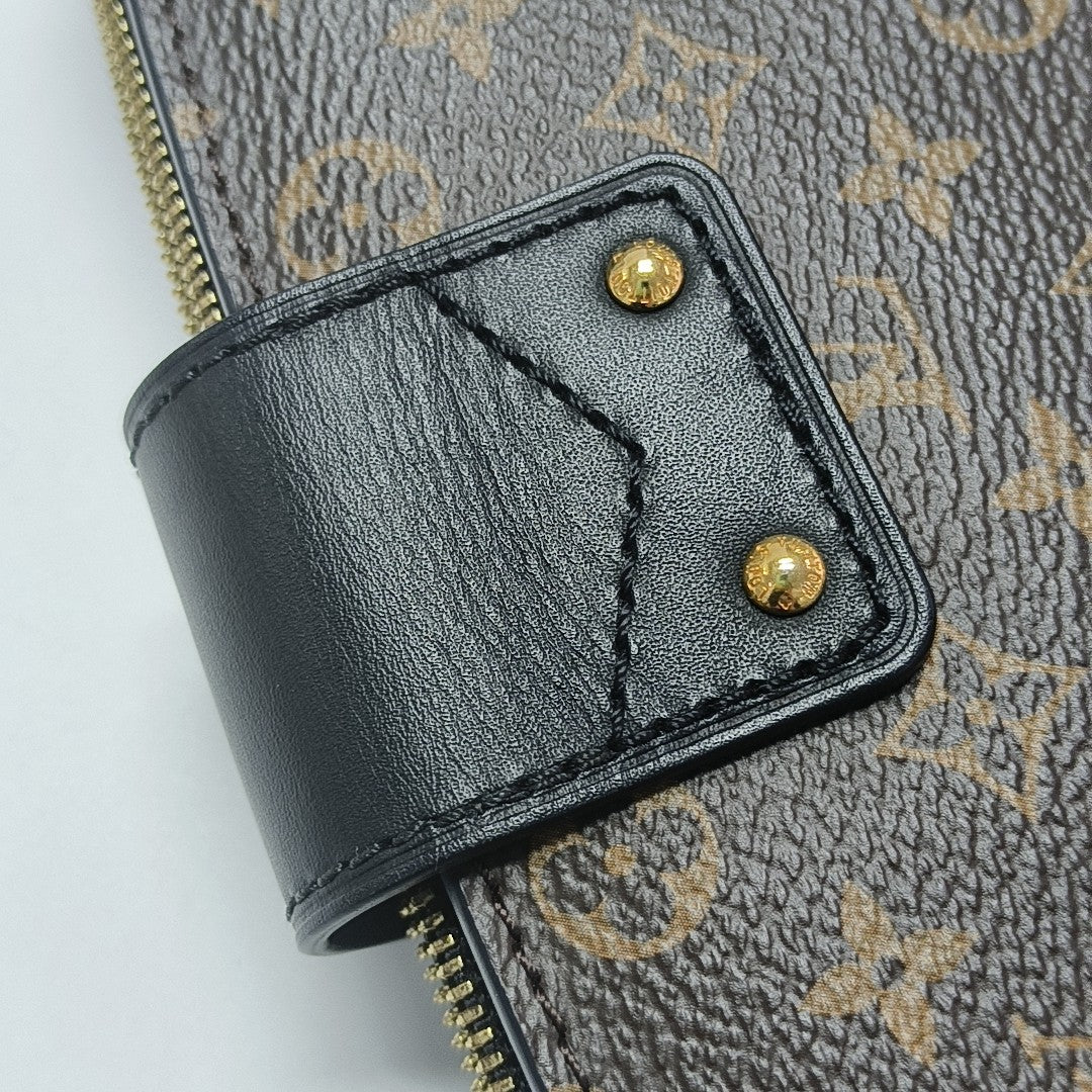 TRUNK Monogram Coated Canvas Brown