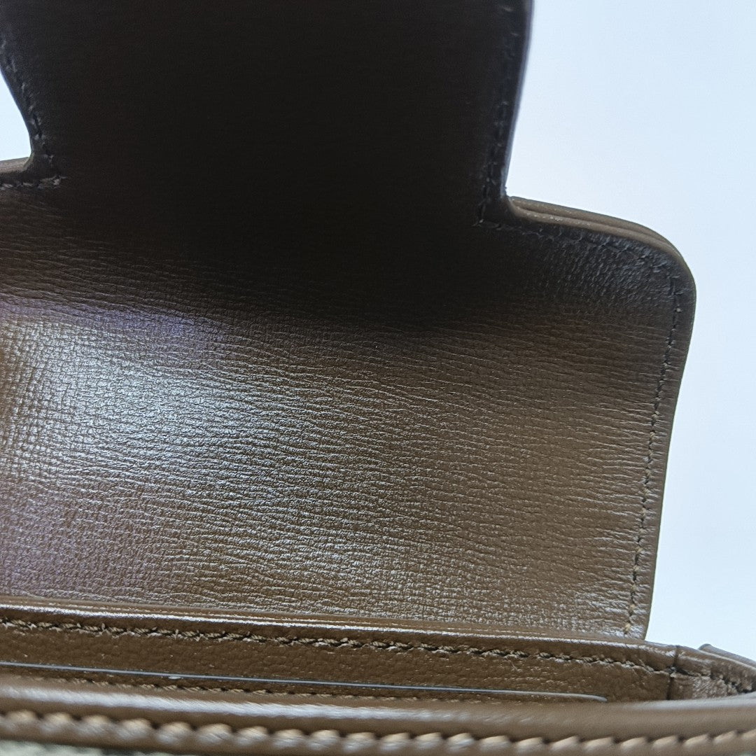 Authenticated pre-owned  Horsebit 1955 Monogram Coated Canvas Beige - Shoulder Bag at Looply