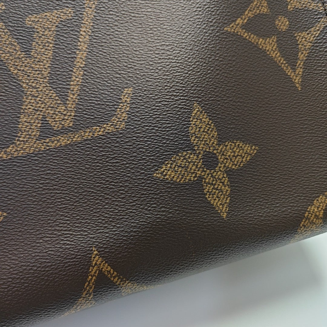 ONTHEGO MM Monogram Coated Canvas Brown