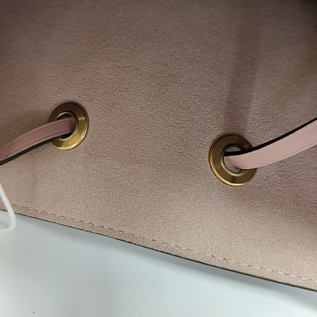 NÉONOÉ MM Monogram Coated Canvas Brown