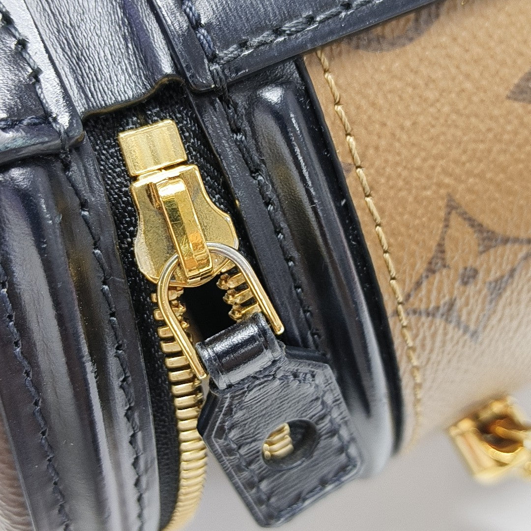 CANNES PM Monogram Coated Canvas Brown