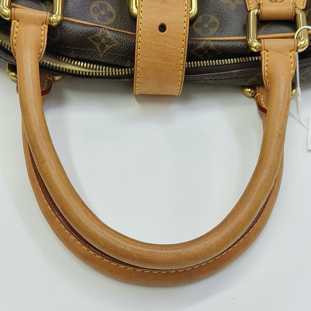 MANHATTAN GM Monogram Coated Canvas Brown