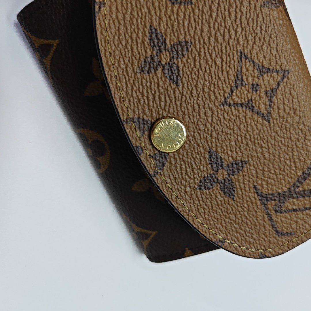 Monogram Coated Canvas Wallet Brown