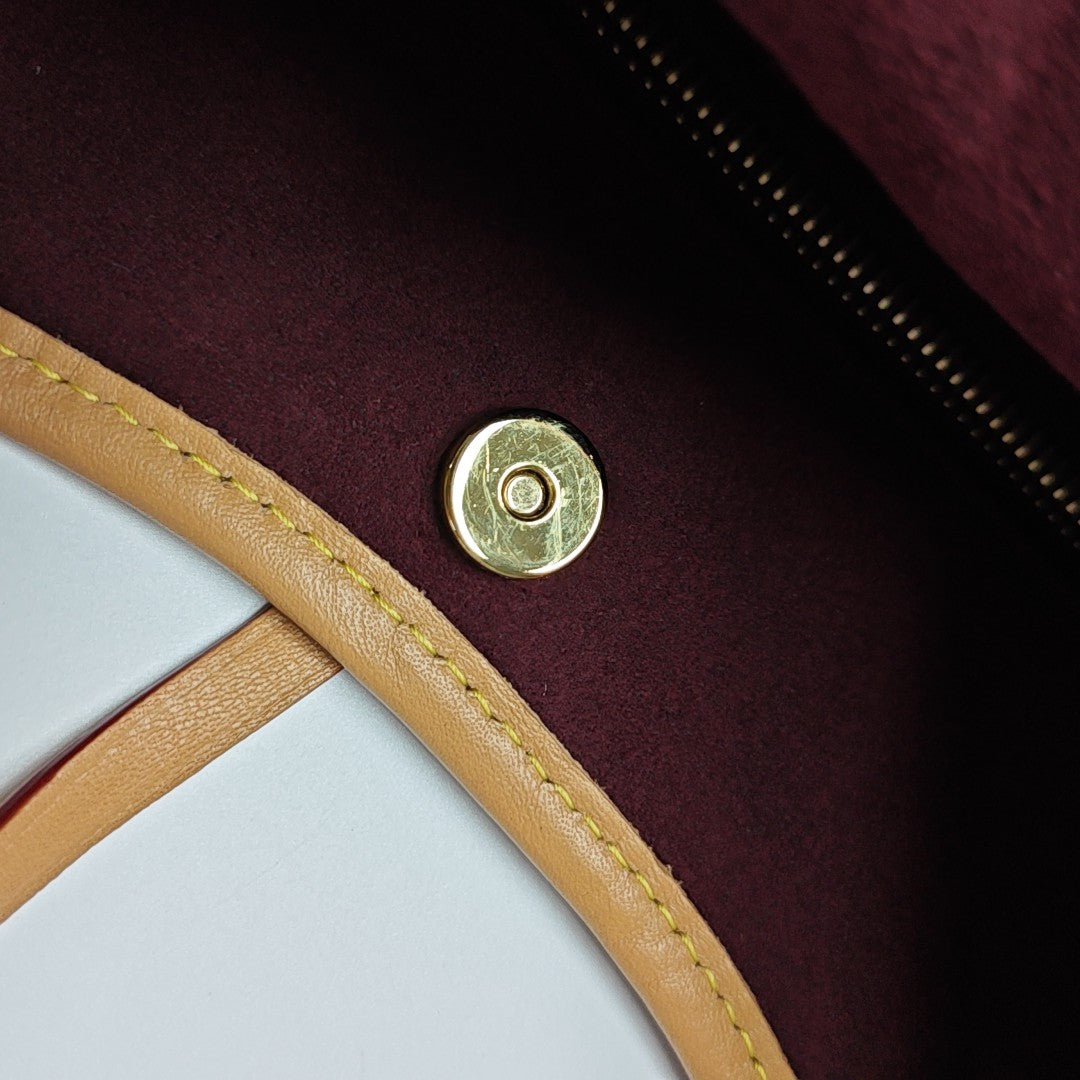 CARRYALL PM Monogram Coated Canvas Brown