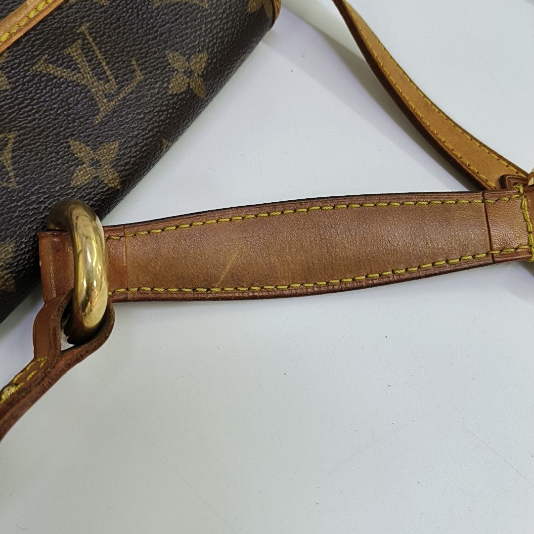 TIKAL Monogram Coated Canvas Brown