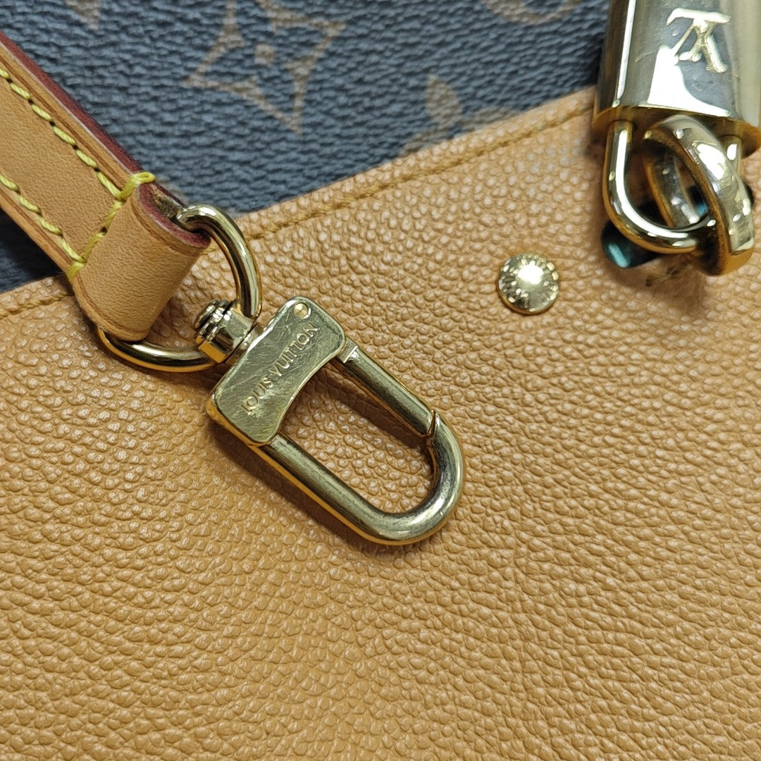 VÉNUS Monogram Coated Canvas Brown