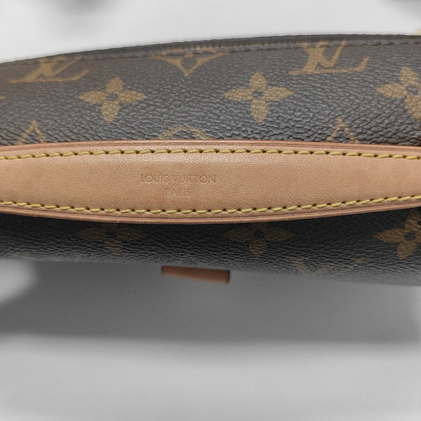 MÉTIS EAST WEST Monogram Coated Canvas Brown