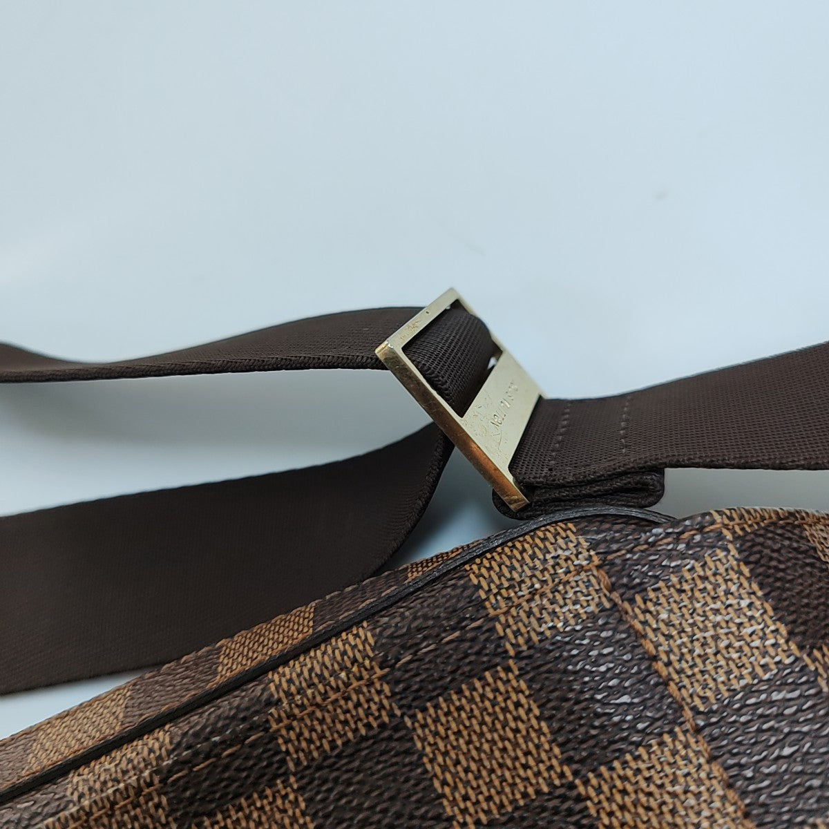 GÉRONIMOS Damier Ebene Coated Canvas Brown