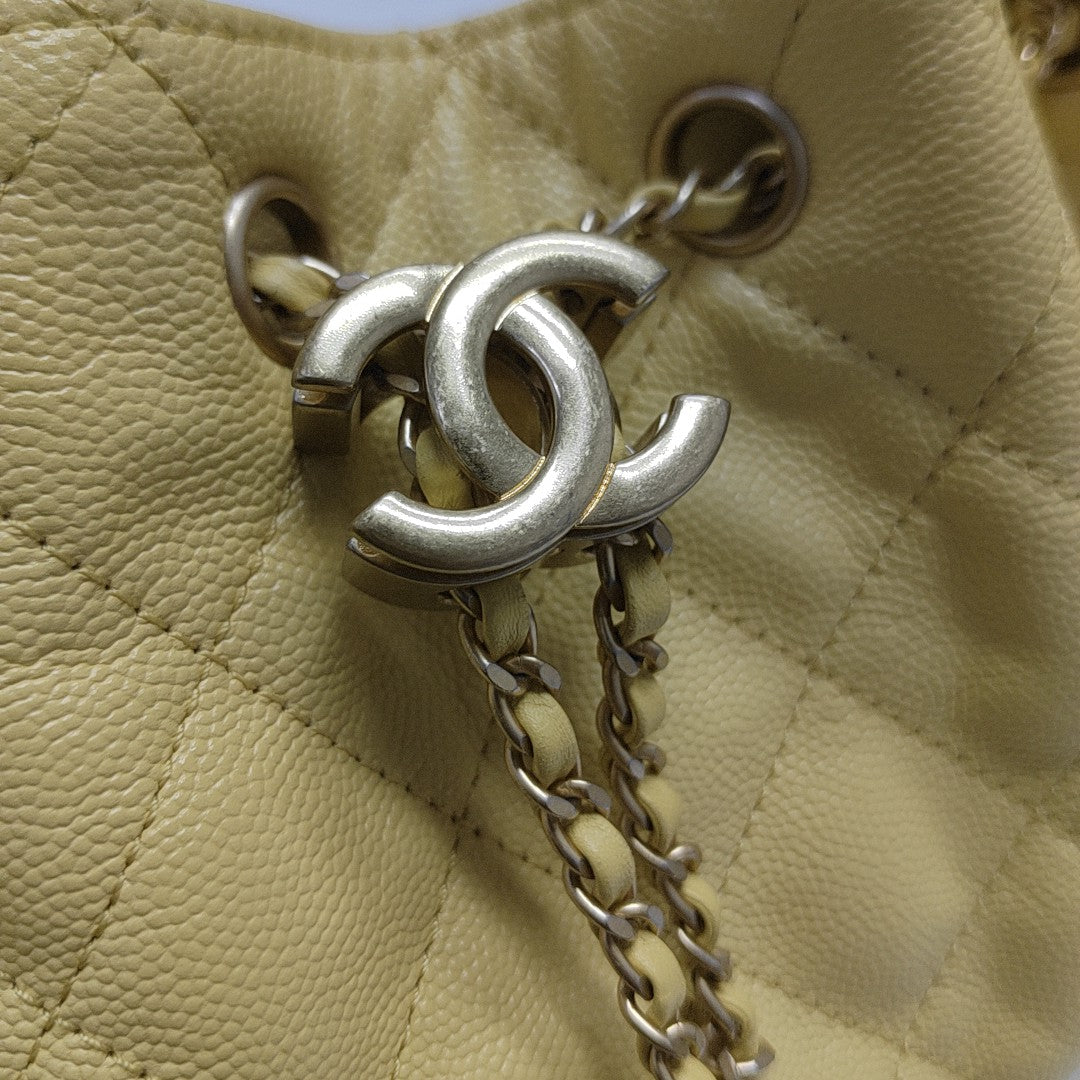 CHANEL 25 Quilted Grained Calfskin Yellow