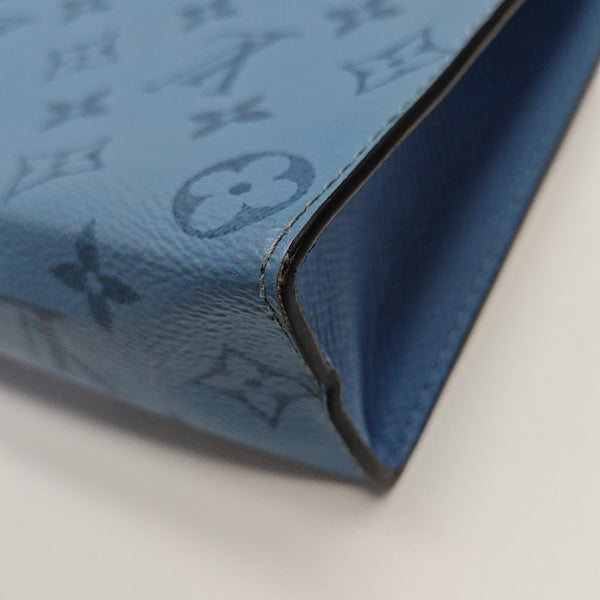 Pochette Voyag MM Monogram Coated Canvas Blue