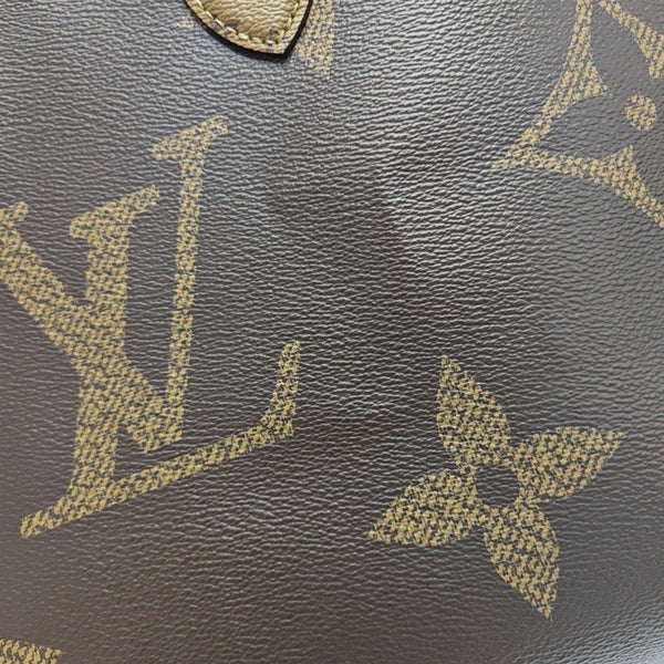 ONTHEGO MM Monogram Coated Canvas Brown