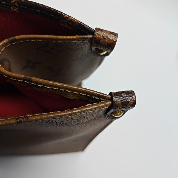 ONTHEGO MM Monogram Coated Canvas Brown