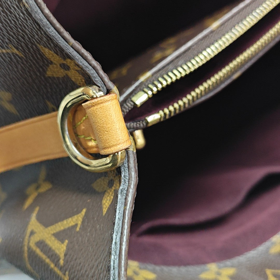 MONTAIGNE GM Monogram Coated Canvas Brown