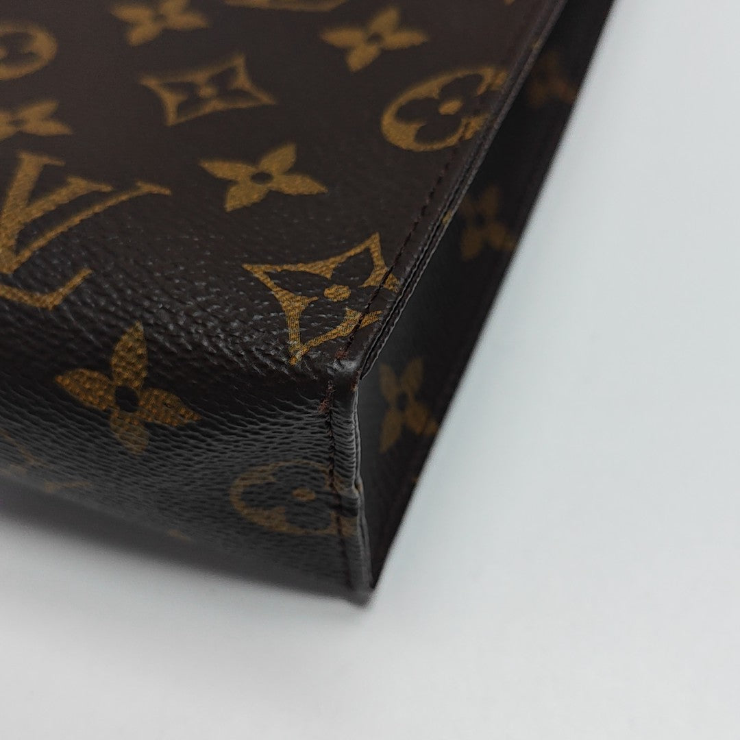 TOILET POCKET 26 Monogram Coated Canvas Brown