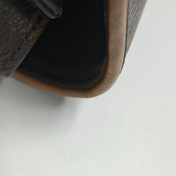Pochette Camille Monogram Coated Canvas Brown