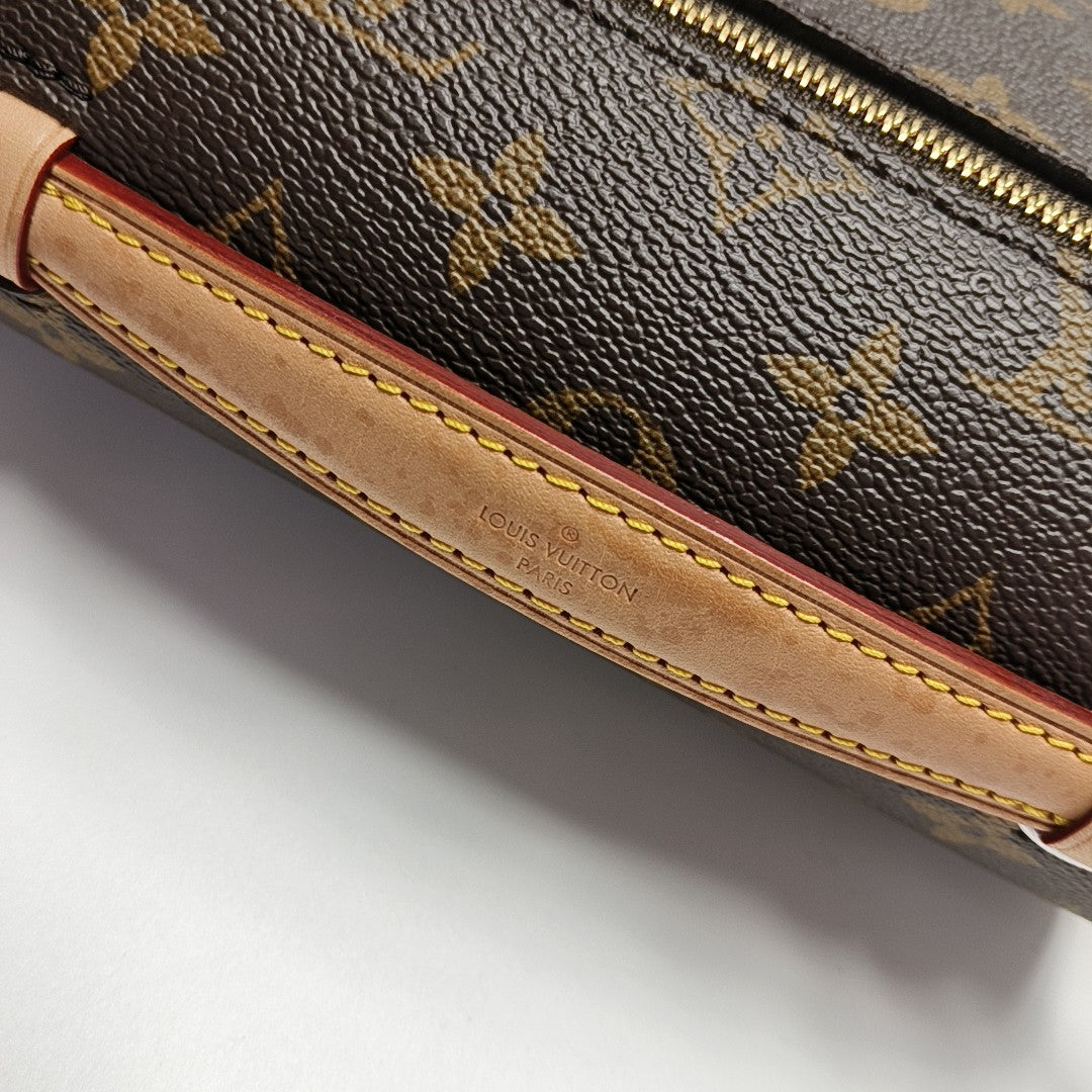 MÉTIS EAST WEST Monogram Coated Canvas Brown