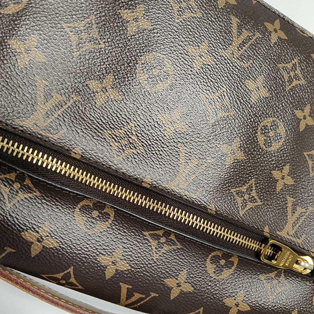 MÉTIS MM Monogram Coated Canvas Brown