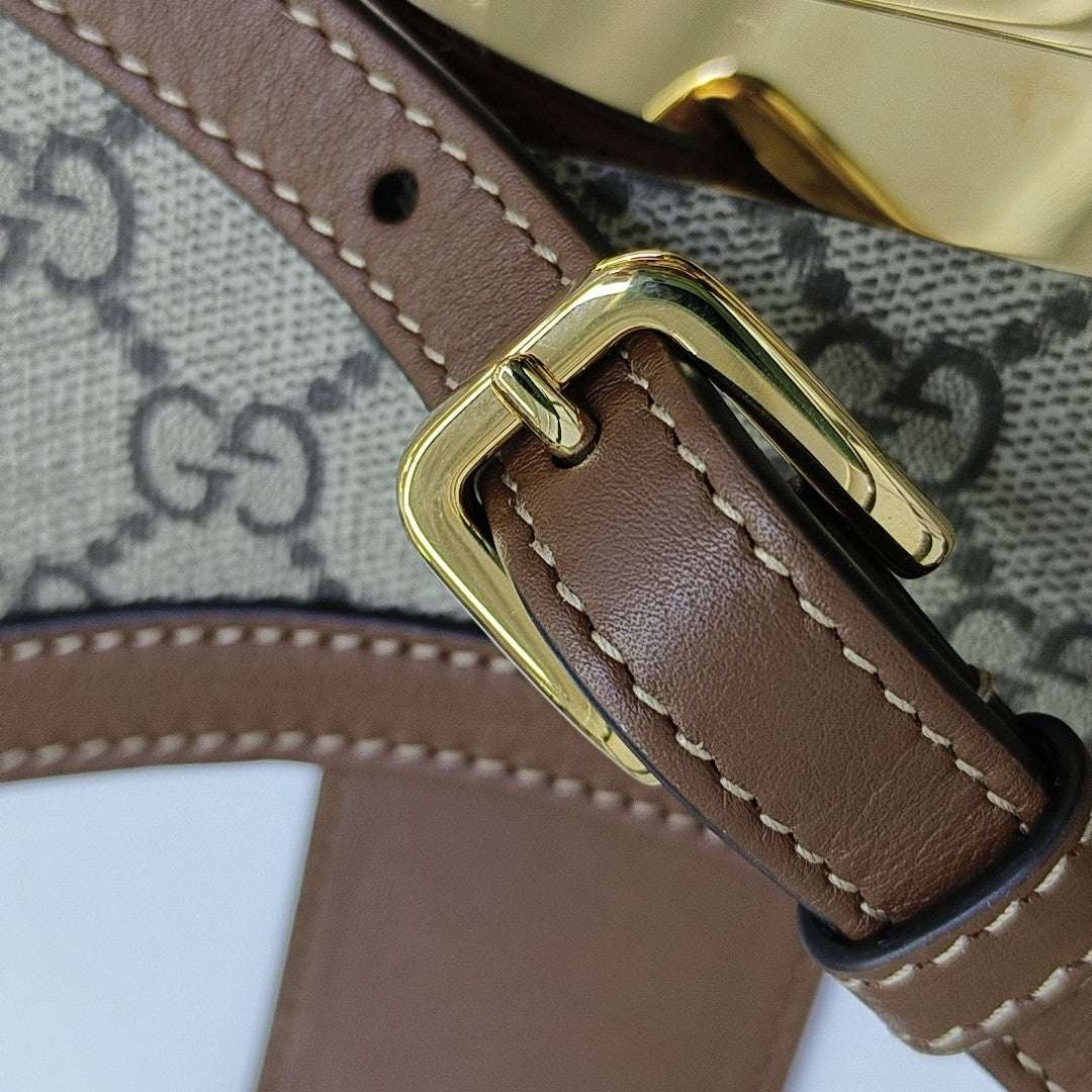 Padlock Medium Monogram Coated Canvas Brown