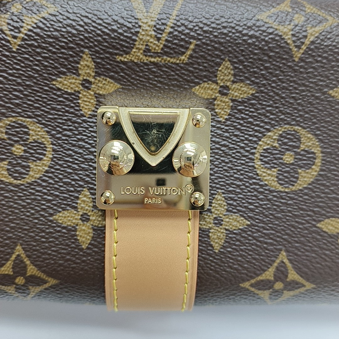 Pochette Mia Monogram Coated Canvas Brown