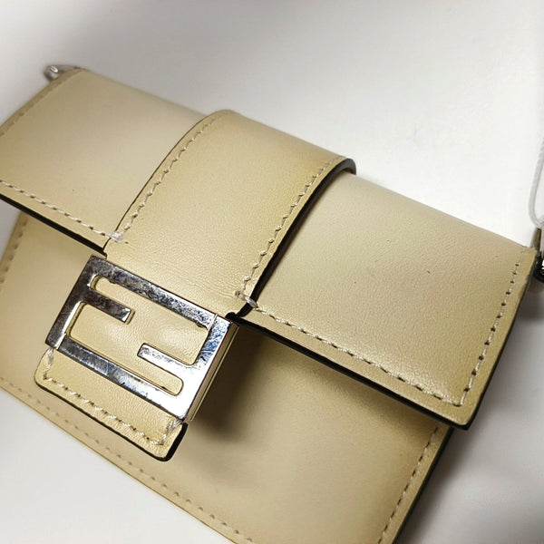 Authenticated pre-owned  Baguette Mini Calfskin Beige - Shoulder Bag at Looply