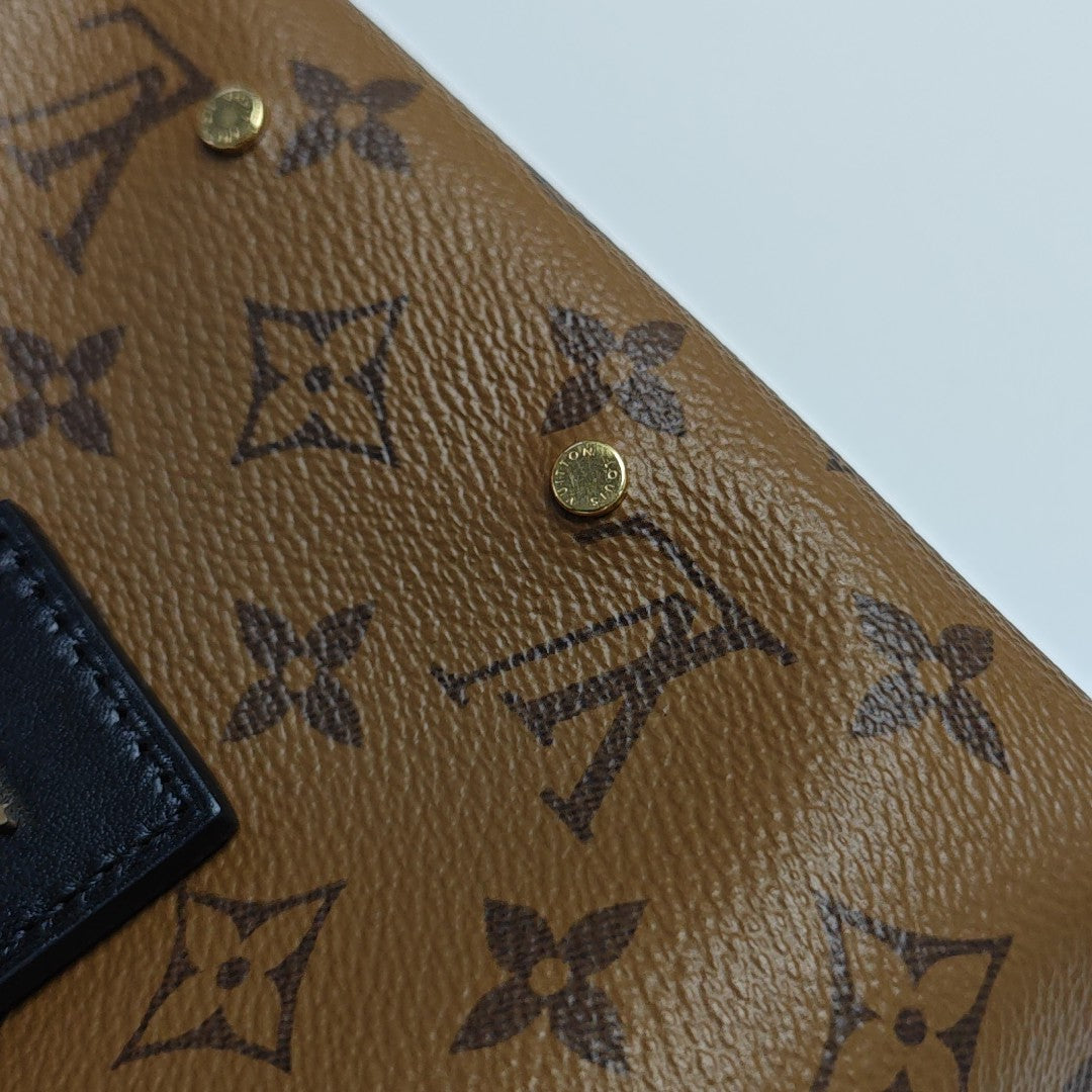 ATLANTIS PM Monogram Coated Canvas Brown