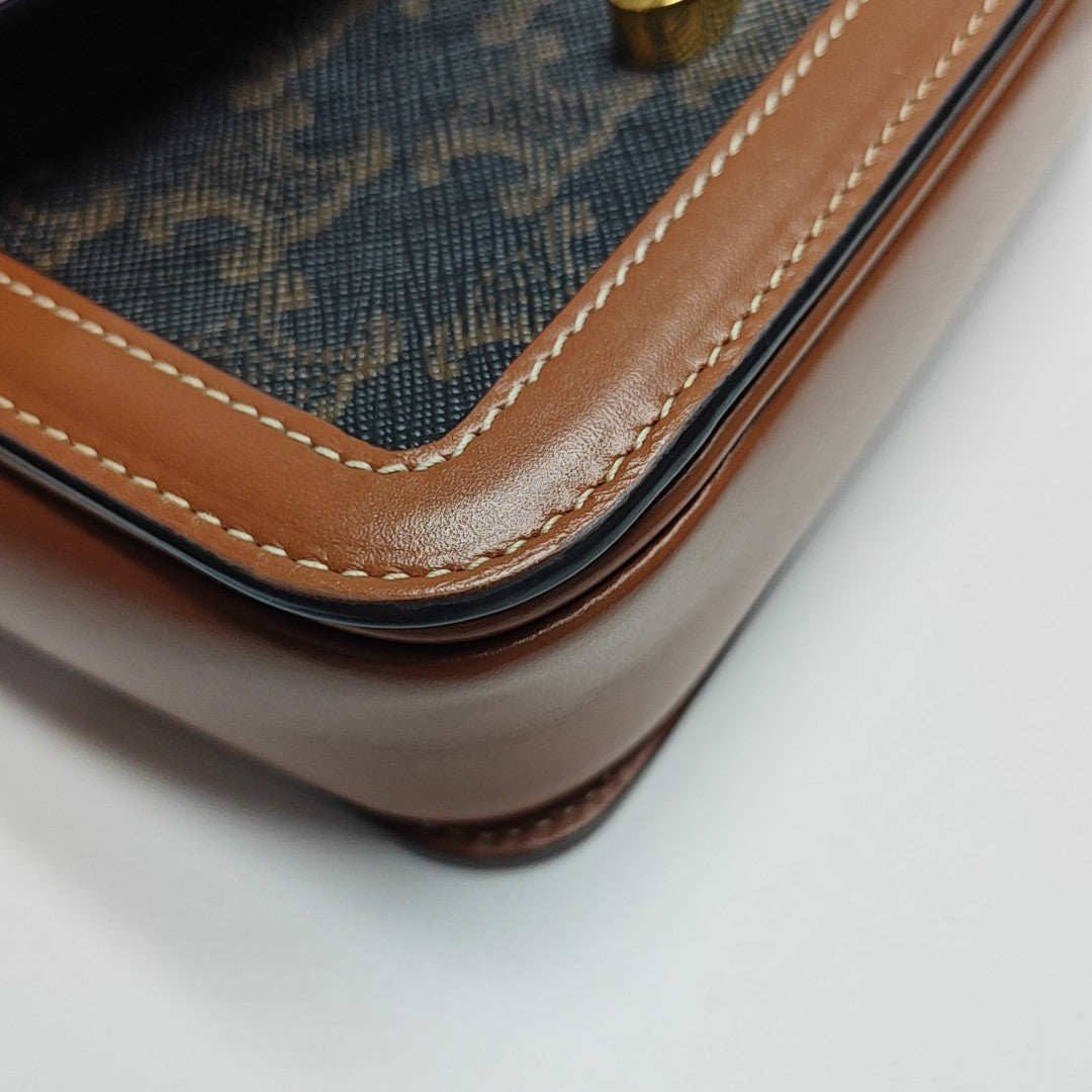 TRIOMPHE Small Coated Canvas Brown