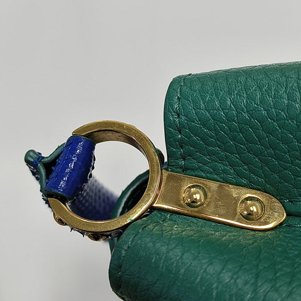 Authenticated pre-owned  CAPUCINES Mini Calfskin Green - Shoulder Bag at Looply
