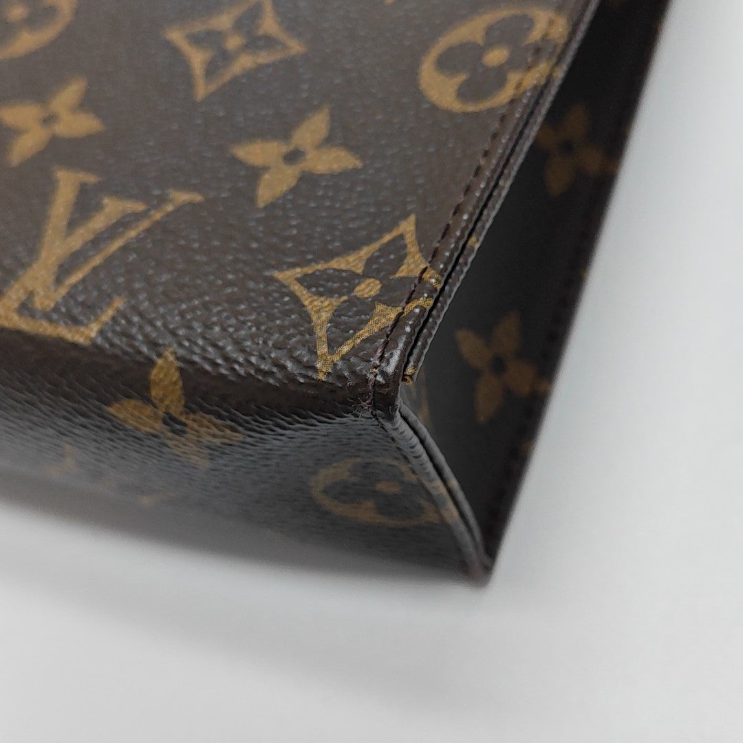 TOILET POCKET 26 Monogram Coated Canvas Brown