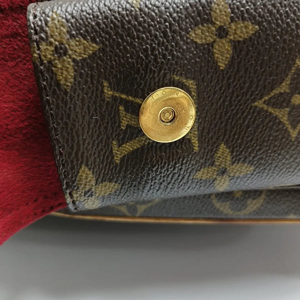 EXCENTRI-CITE Monogram Coated Canvas Brown