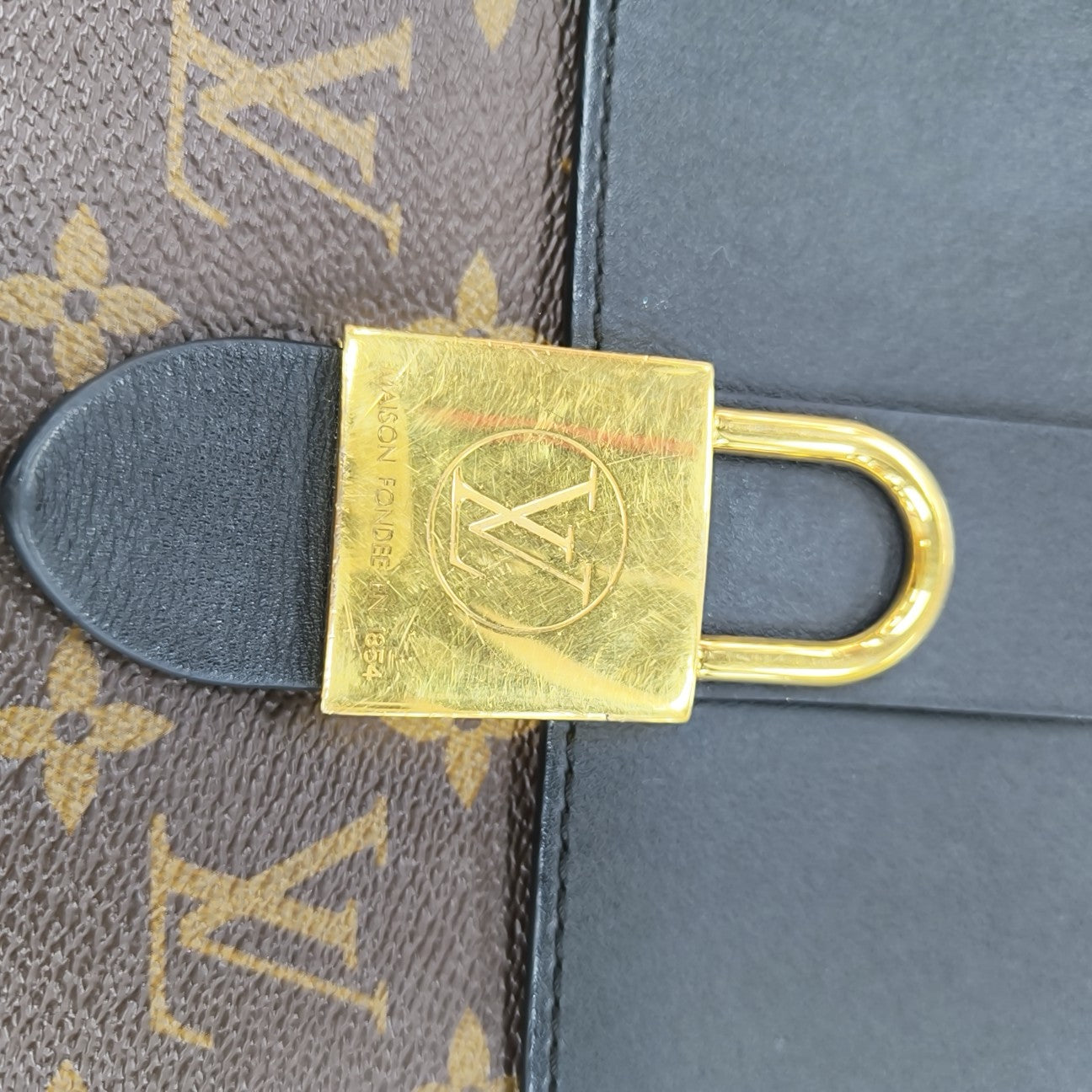 LOCKY BB Monogram Coated Canvas Brown