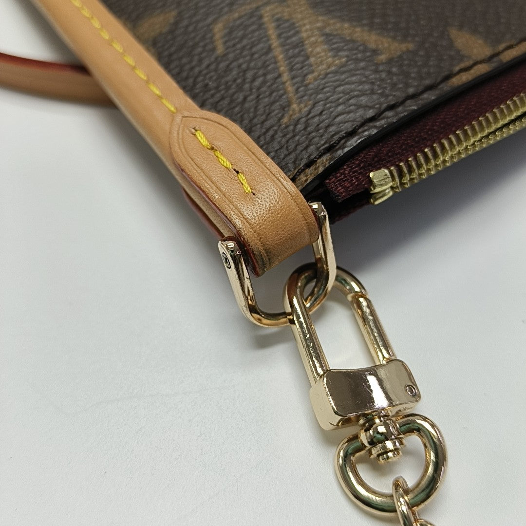 CARRYALL PM Monogram Coated Canvas Brown